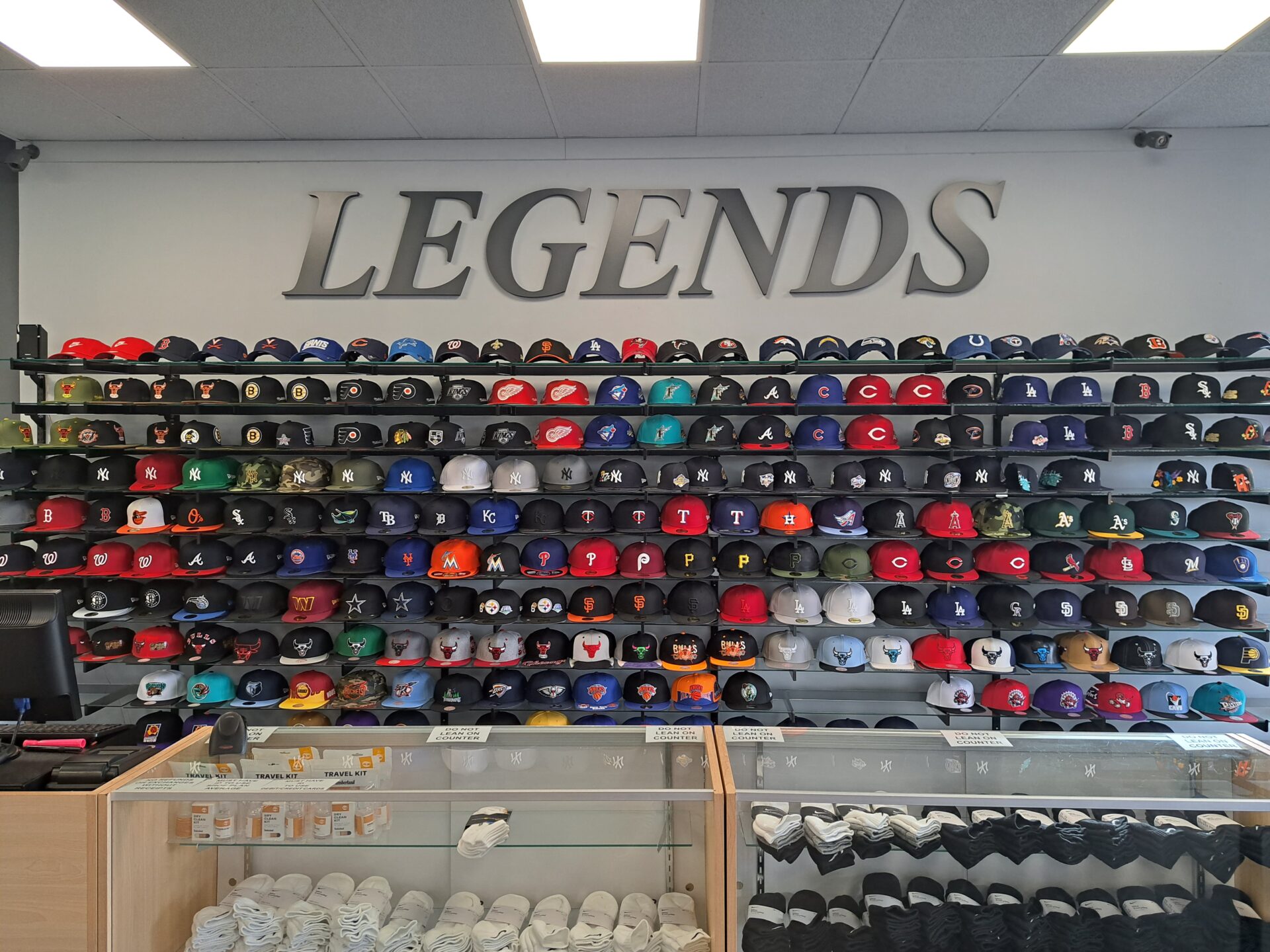 legends showroom front look with caps