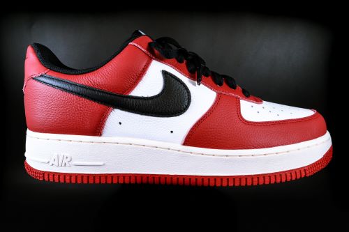 10 Compelling Reasons Why You Need Nike Air Force Ones In Your Shoe Collection. Air Force Ones on Black Background.